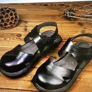 Finnish Naisteen Hollow, Alissa Koriin strap cover toe size size 8 black Leather
